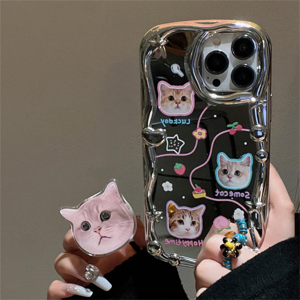 Coque iPhone 12 Pro transparente avec têtes de chat 3D colorées et anneau de support rose. - Wiqeo