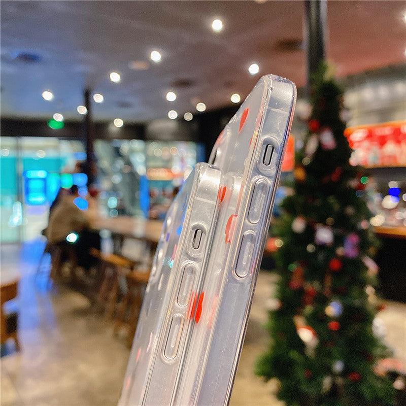 Coques transparentes fines avec boutons colorés pour iPhone, style minimaliste, fond flou intérieur café festif. - Wiqeo