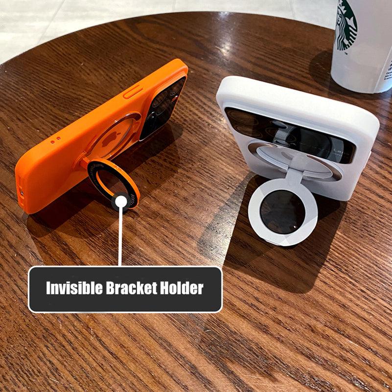 Coque MagSafe orange avec support rabattable circulaire et coque blanche avec support sur table en bois. - Wiqeo