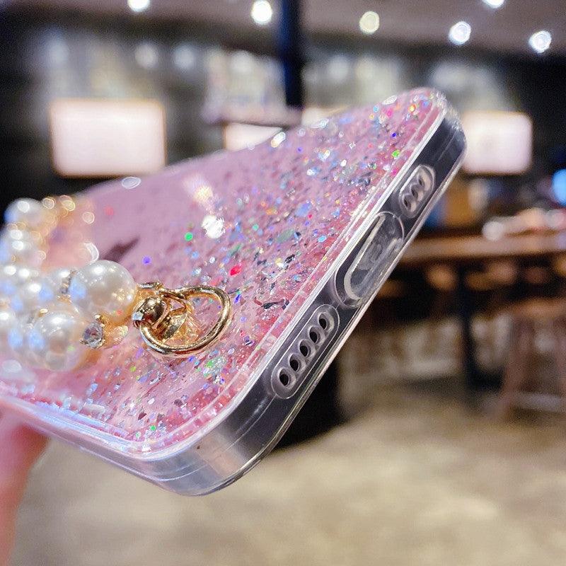 Coque iPhone 12 Pro Max rose scintillante avec paillettes multicolores et chaîne de perles blanches. - Wiqeo