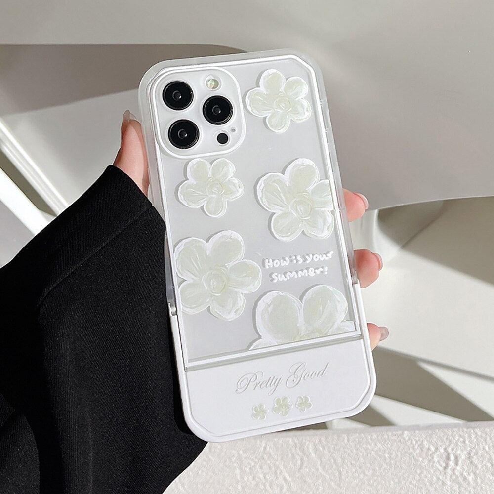 Coque transparente iPhone 12 Pro Max avec fleurs blanches en relief et support latéral intégré. - Wiqeo